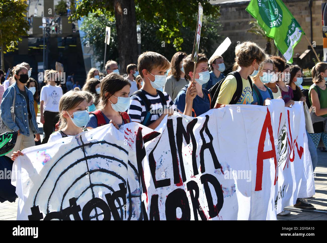 Young children march in Freiburg Germany Fridays for Future protest German climate activists demonstrate against global warming Stock Photo