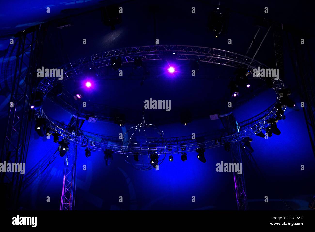 Stage lights glowing in the dark. Live music festival concept background Stock Photo