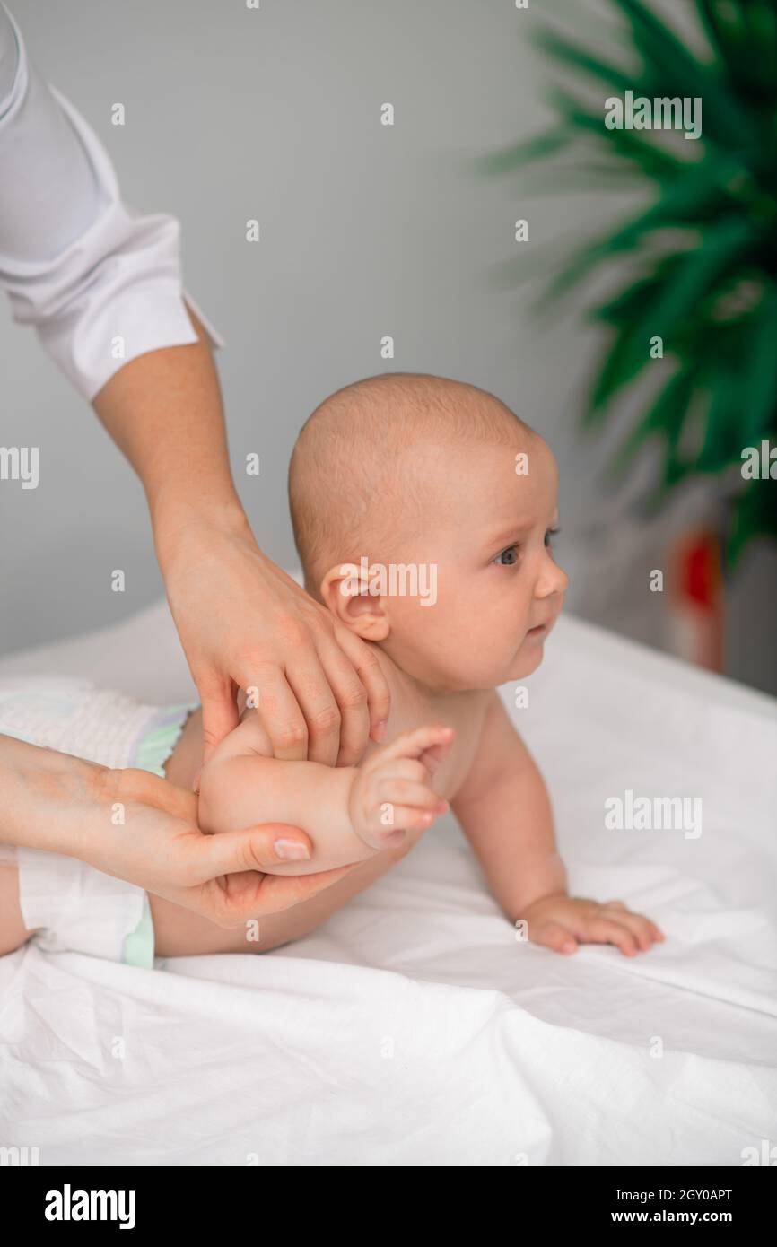 Cute tranquil baby undergoing a medical test Stock Photo