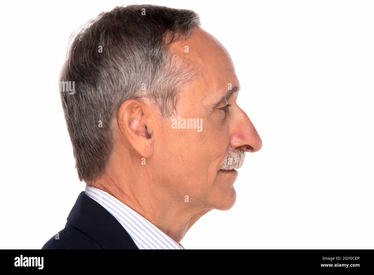 mature man with grey mustache side view . retired latino hispanic people smile with confident.senior latin man isolated on white. Close up face of hap Stock Photo