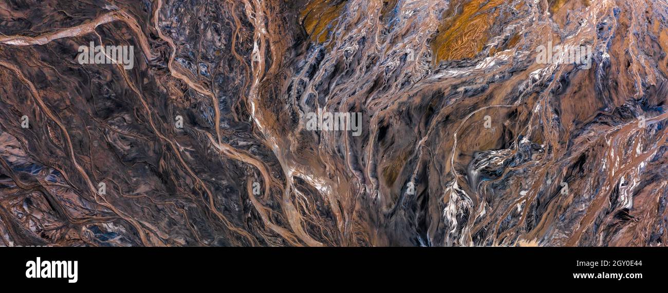Aerial view of the famous red mud disaster site, abstract lines, surreal landscape, icelandic feeling. Stock Photo