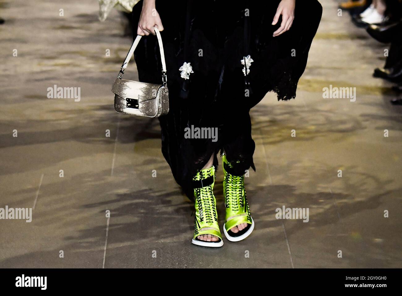 Paris, France. 05th Oct, 2021. Details, accessories, handbags and shoes on  the runway at the Louis Vuitton fashion show during Spring/Summer 2022  Collections Fashion Show at Paris Fashion Week in Paris, France
