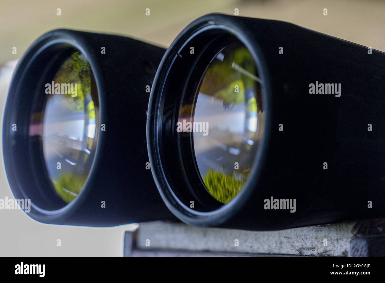 Binoculars detail with sea glass reflection Stock Photo