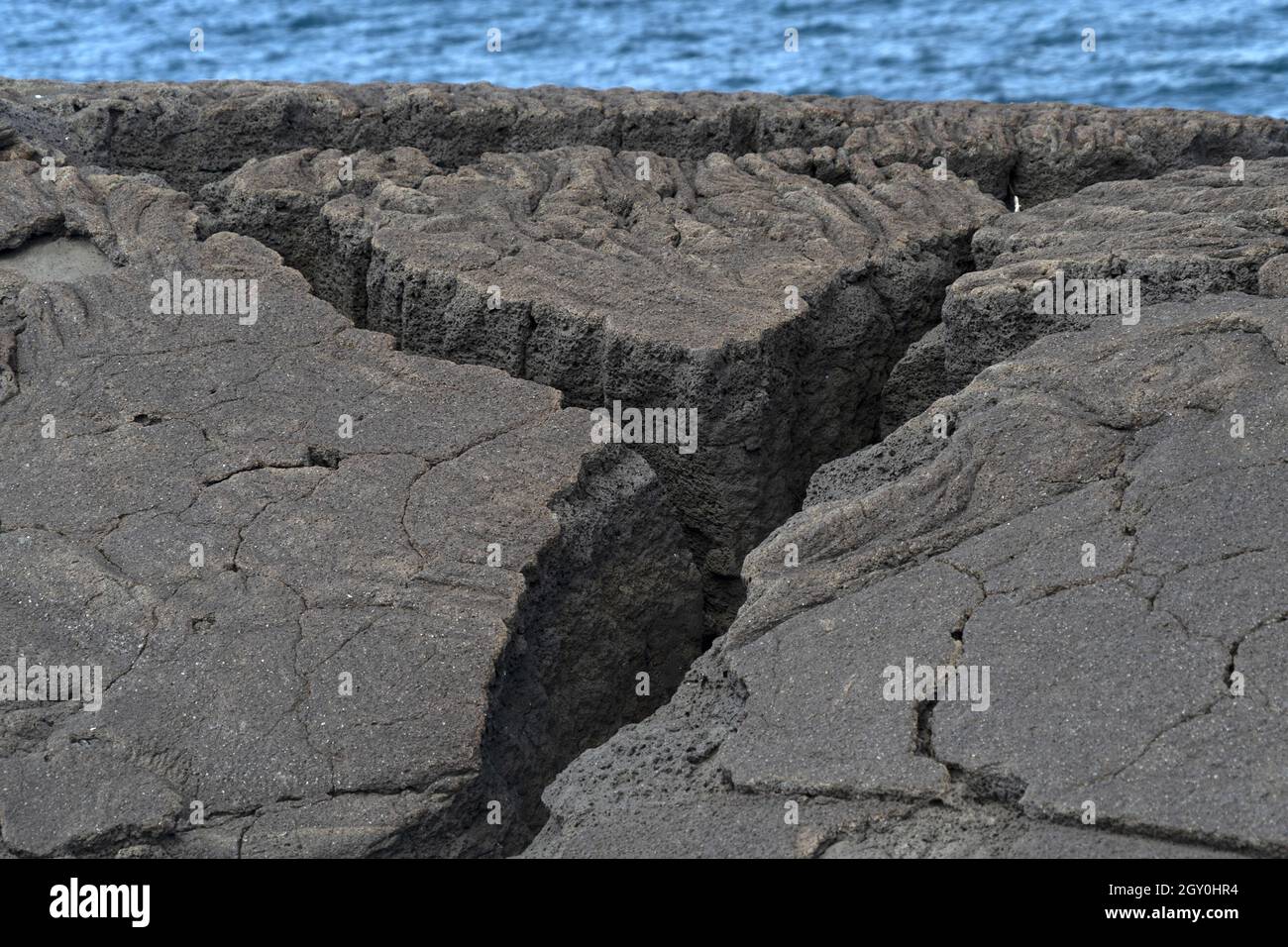 pico azores lava field by the sea detail close up Stock Photo - Alamy