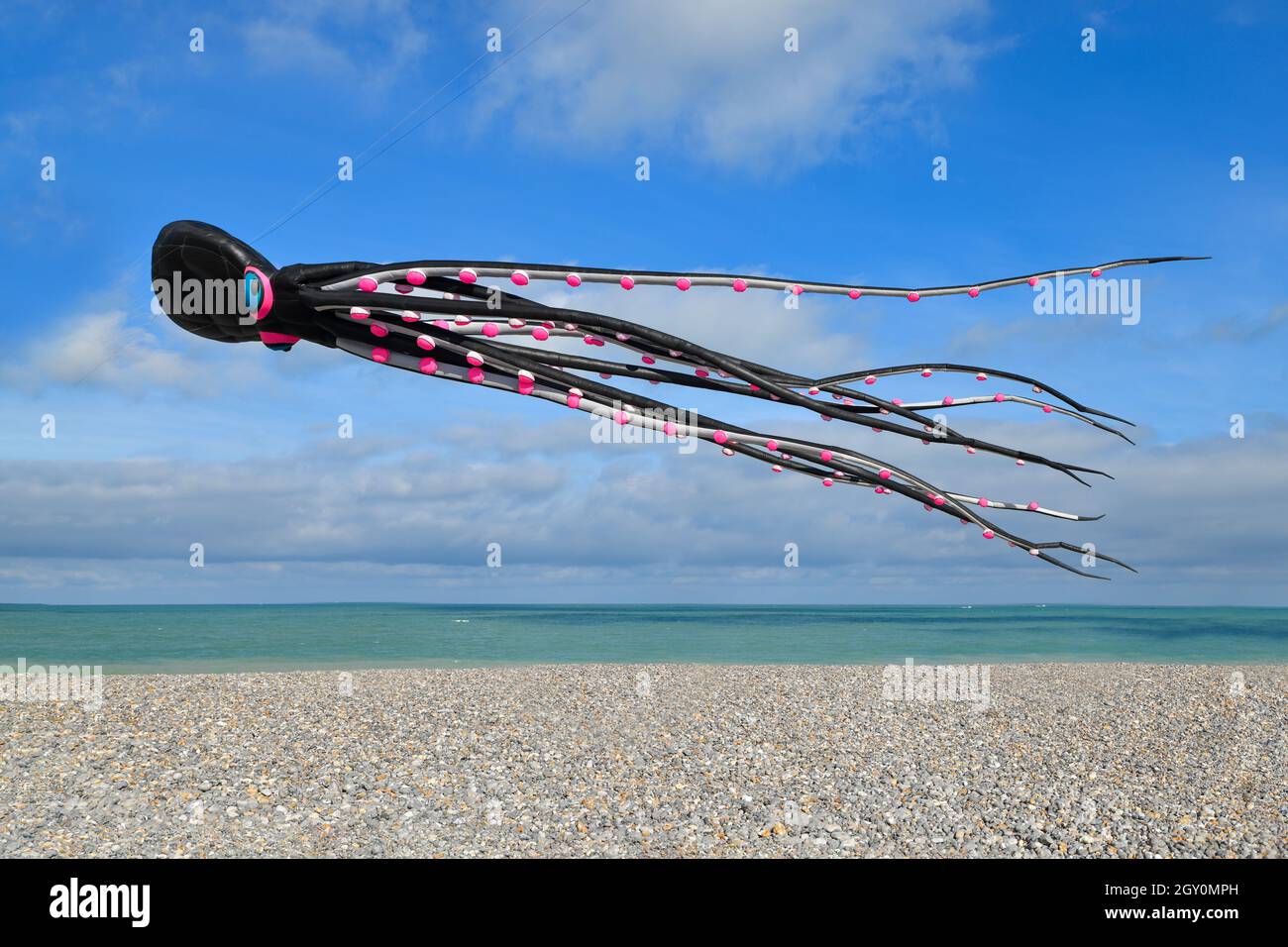 DIEPPE, FRANCE - SEPTEMBER 11, 2018: Kite festival. Octopus kites in the sky in Atlantic ocean Stock Photo
