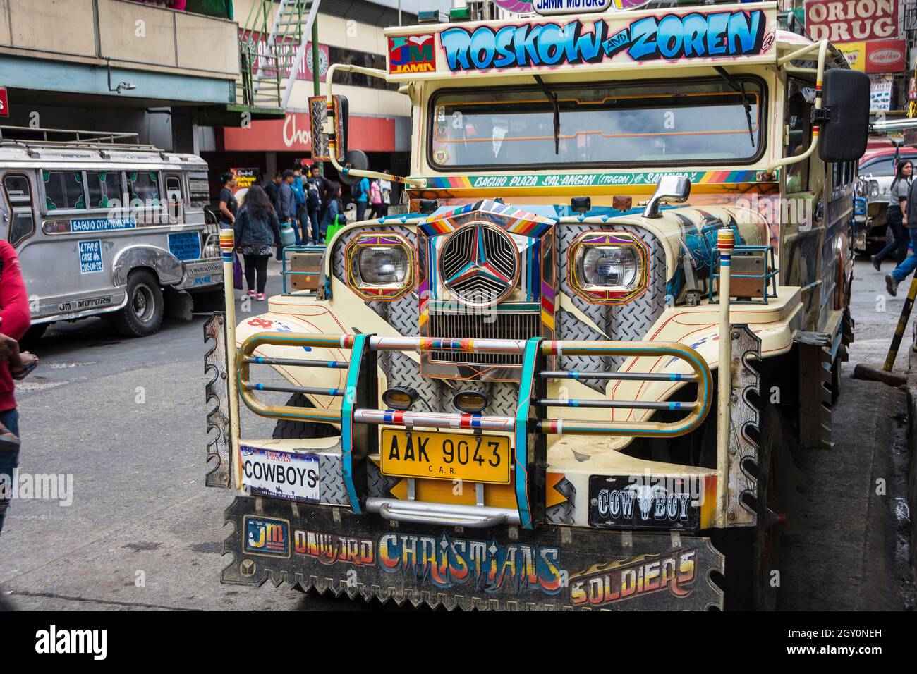 Front view of a colorful jeepney in the streets of Baguio city, Philippines. Stock Photo