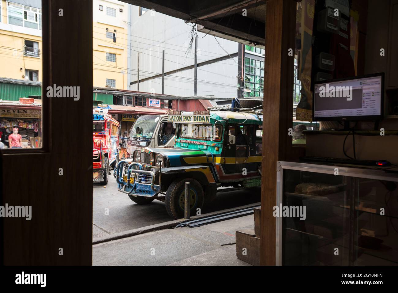 View from a shop on a street with passing jeepneys in Baguio, Philippines Stock Photo