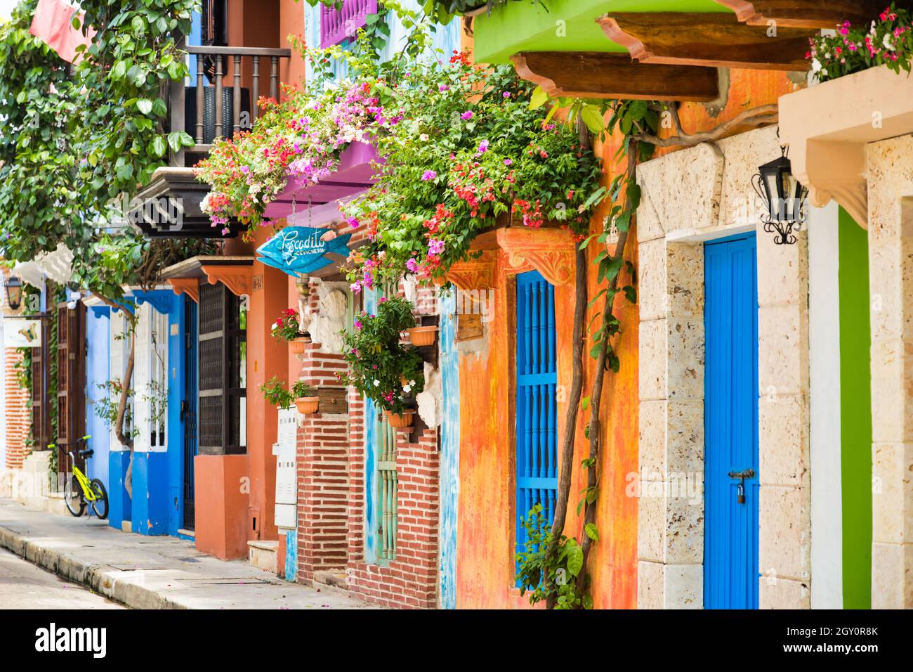 Facades of buildings decorated with flowers Stock Photo - Alamy