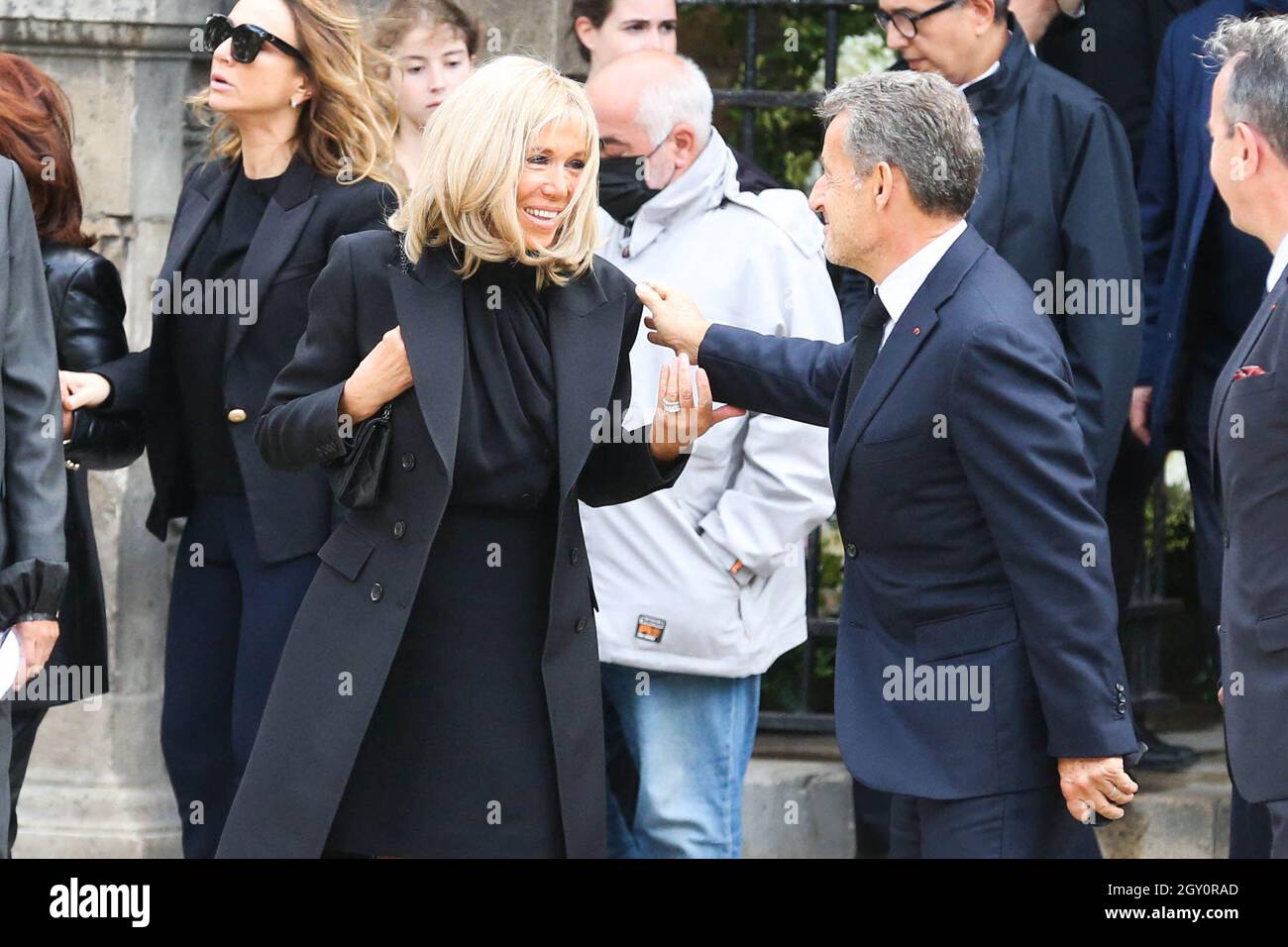 Brigitte Macron with former French president Nicolas Sarkozy during a  tribute mass for French tycoon Bernard Tapie at Saint Germain des Pres  church in Paris, France on October 6, 2021. The funeral