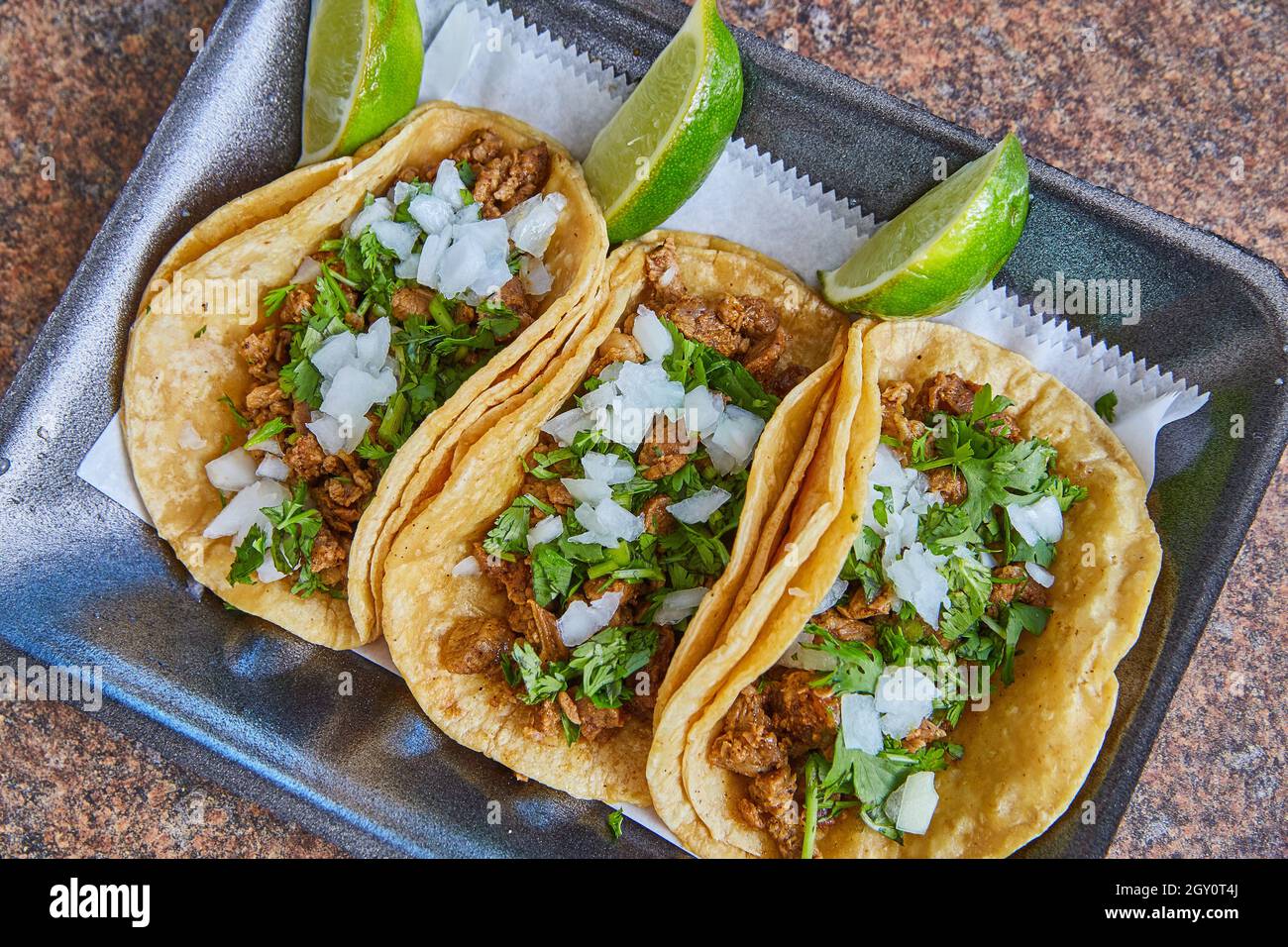 Authentic Mexican taco steak with onions, cilantro, and lime Stock