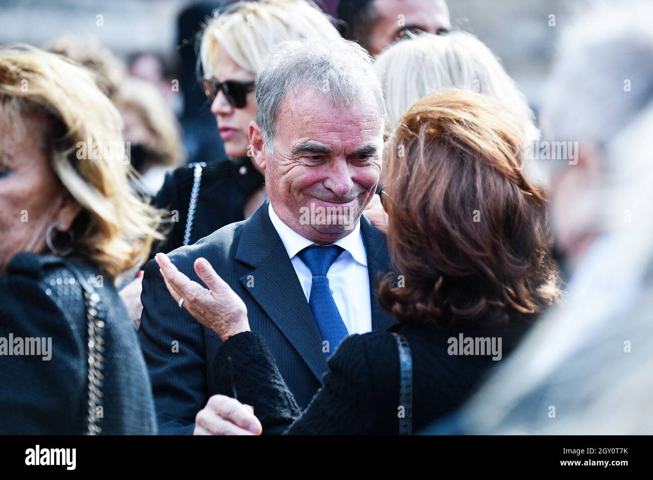 French former professional cyclist Bernard Hinault and Dominique Tapie  during a tribute mass for French tycoon Bernard Tapie at Saint Germain des  Pres church in Paris, France on October 6, 2021. The