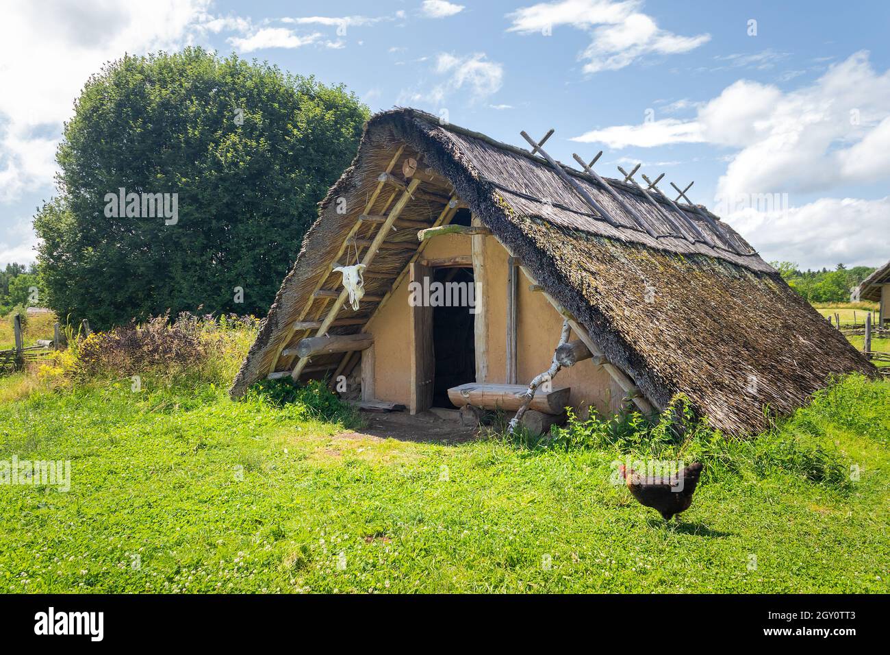 Celtic house with straw thatched roof at Celtic open air museum in