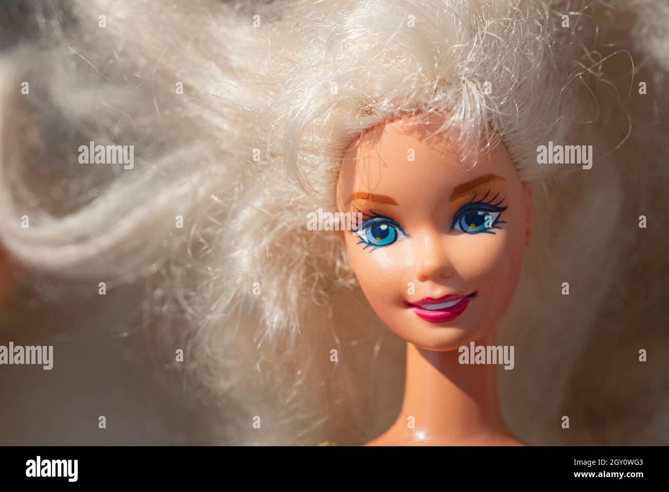 Close-up of a Barbie Doll Face with Blonde Hair Stock Photo