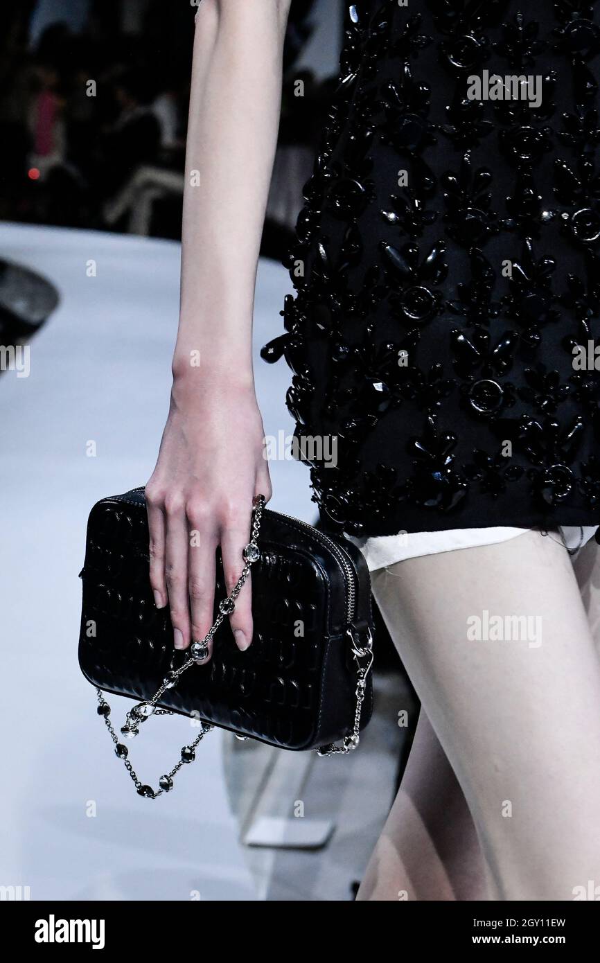 Details, accessories, handbags and shoes on the runway at the Miu Miu  fashion show during Spring/Summer 2022 Collections Fashion Show at Paris  Fashion Week in Paris, France on October 5, 2021. (Photo