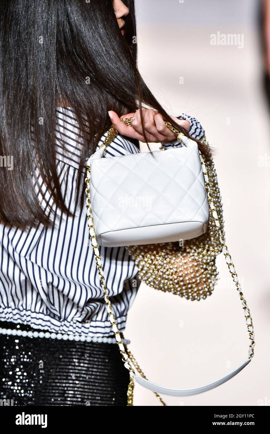 Details, accessories, handbags and shoes on the runway at the Chanel  fashion show during Spring/Summer 2022 Collections Fashion Show at Paris  Fashion Week in Paris, France on October 5, 2021. (Photo by