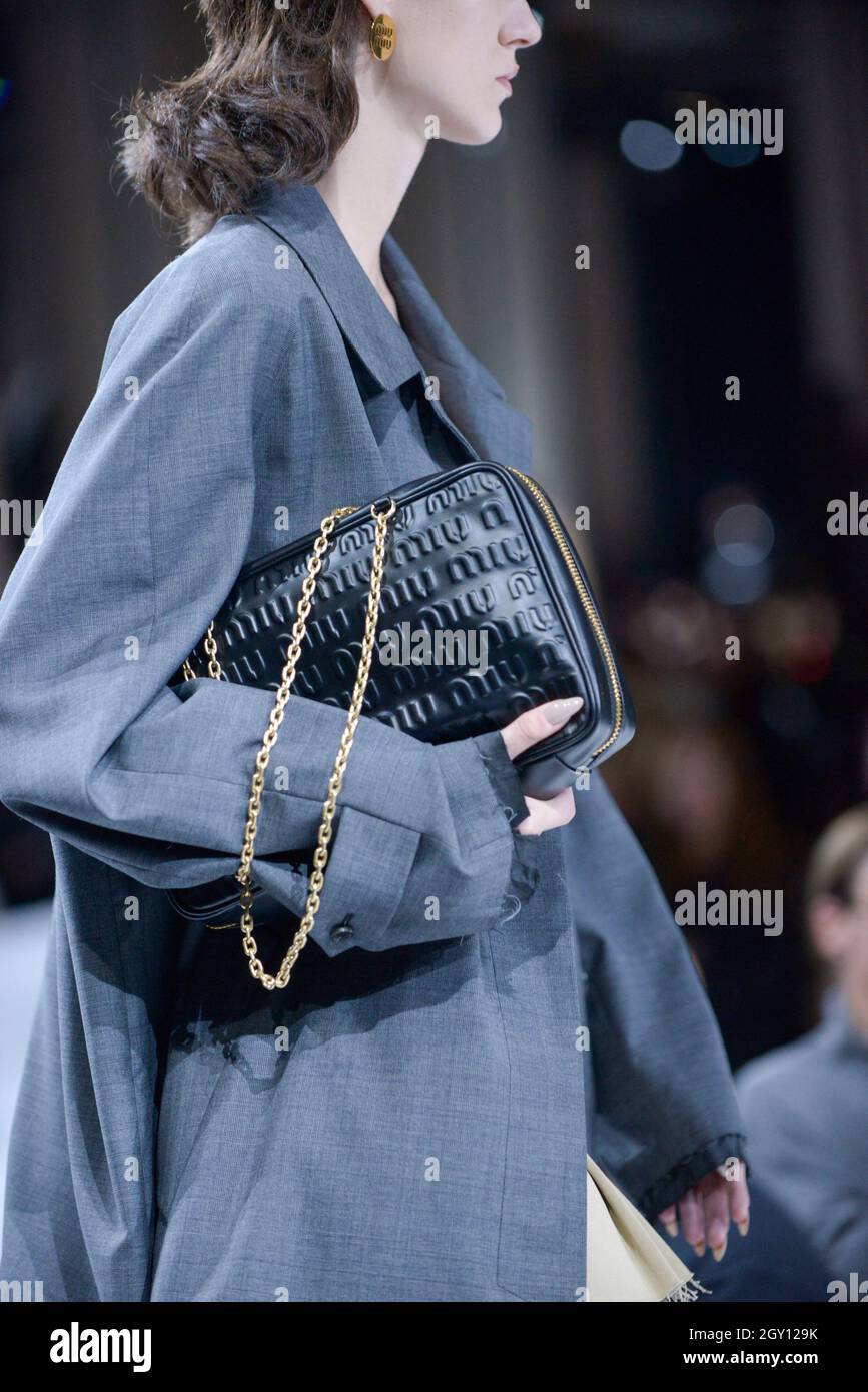 Details, accessories, handbags and shoes on the runway at the Miu Miu  fashion show during Spring/Summer 2022 Collections Fashion Show at Paris Fashion  Week in Paris, France on October 5, 2021. (Photo