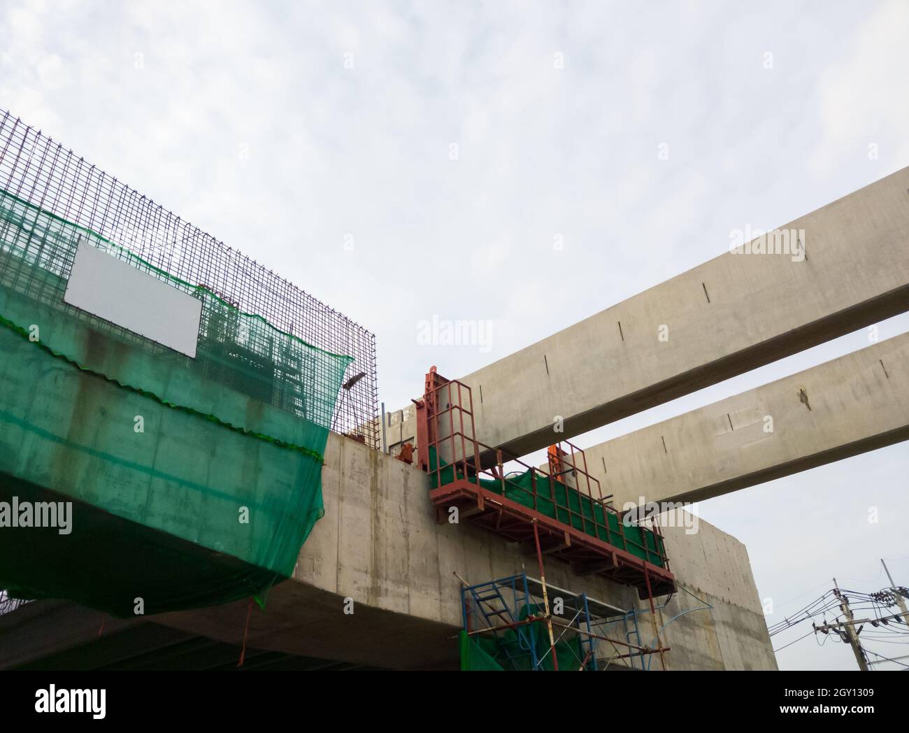 The concrete beam of the monorail track from the large station is under