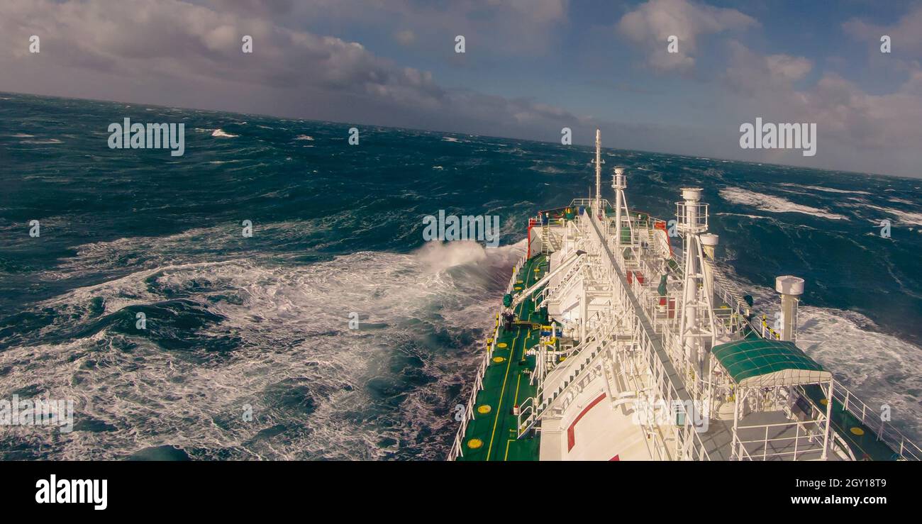 A gas carrier in stormy weather on a sunny day crosses the Bay of Biscay. Stock Photo