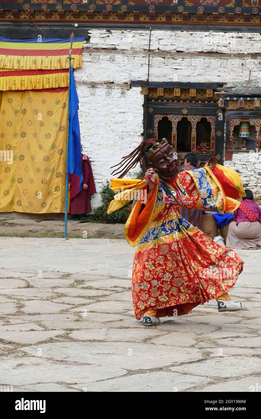 Tsholing cham wrathful deities dance to purify the ground of evil influences at Nalakar Tsechu Stock Photo