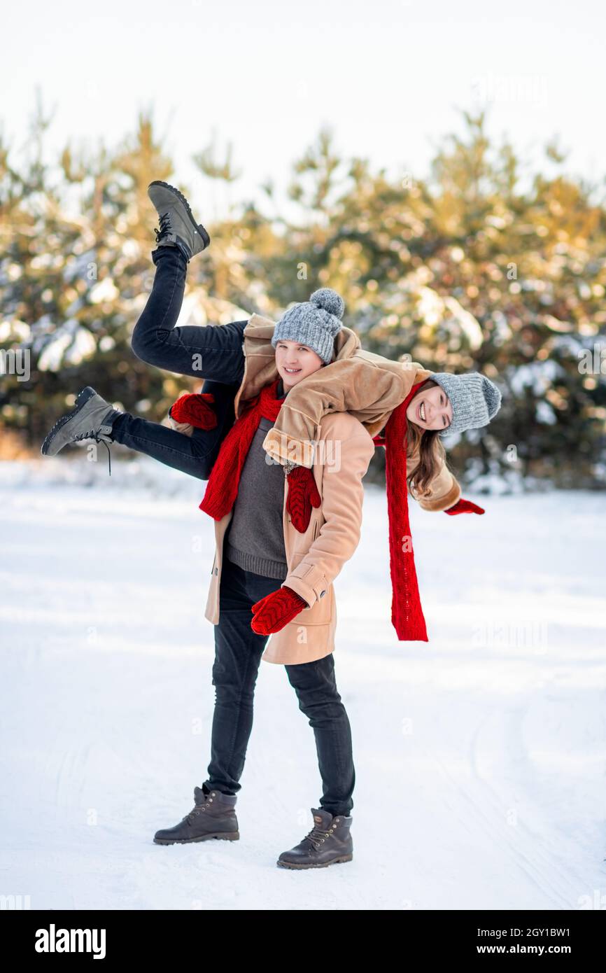 Man shoulder carrying woman hi-res stock photography and images - Alamy