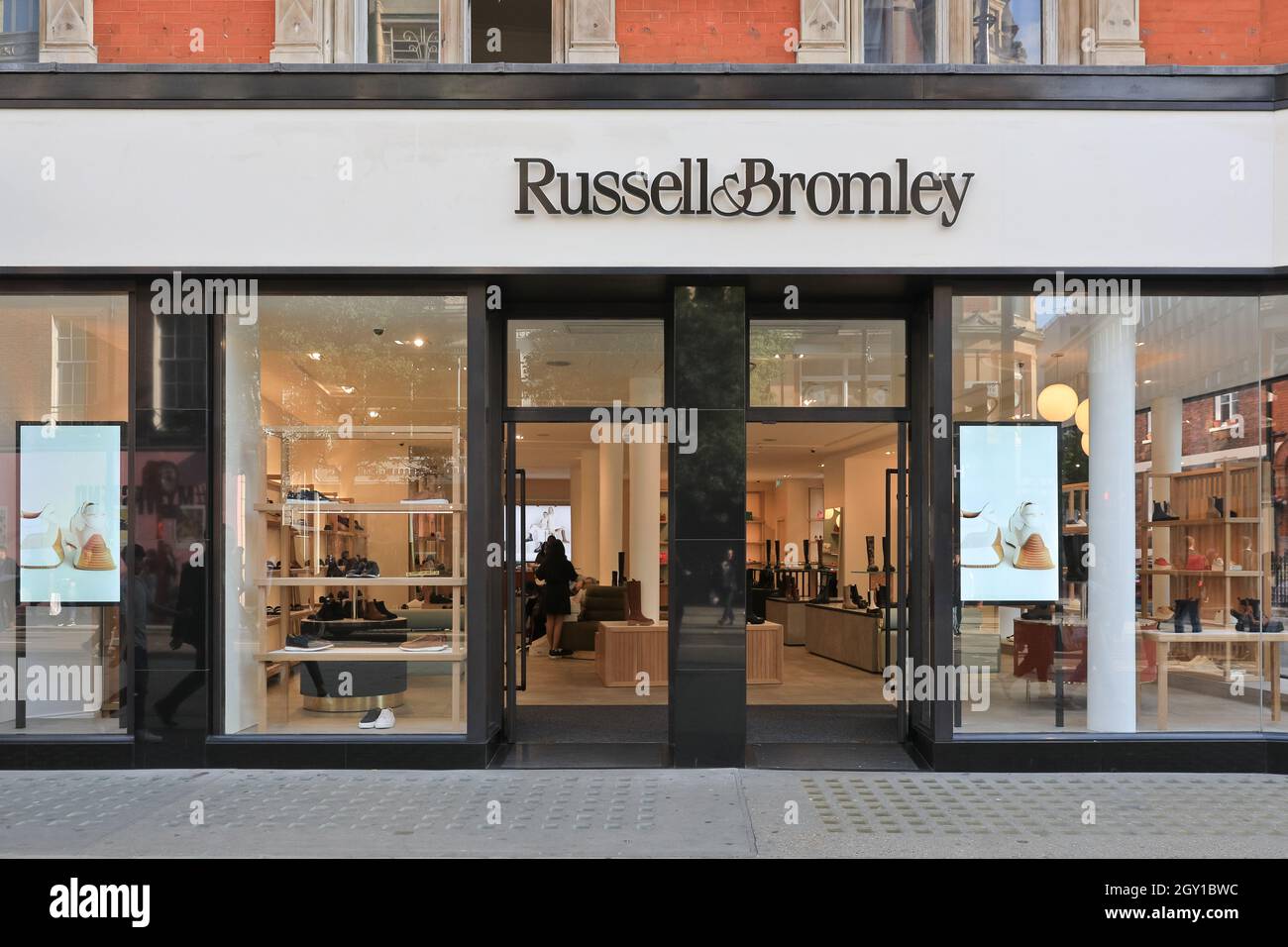 Russel & Bromley British shoe shop exterior, shoppers outside footwear ...
