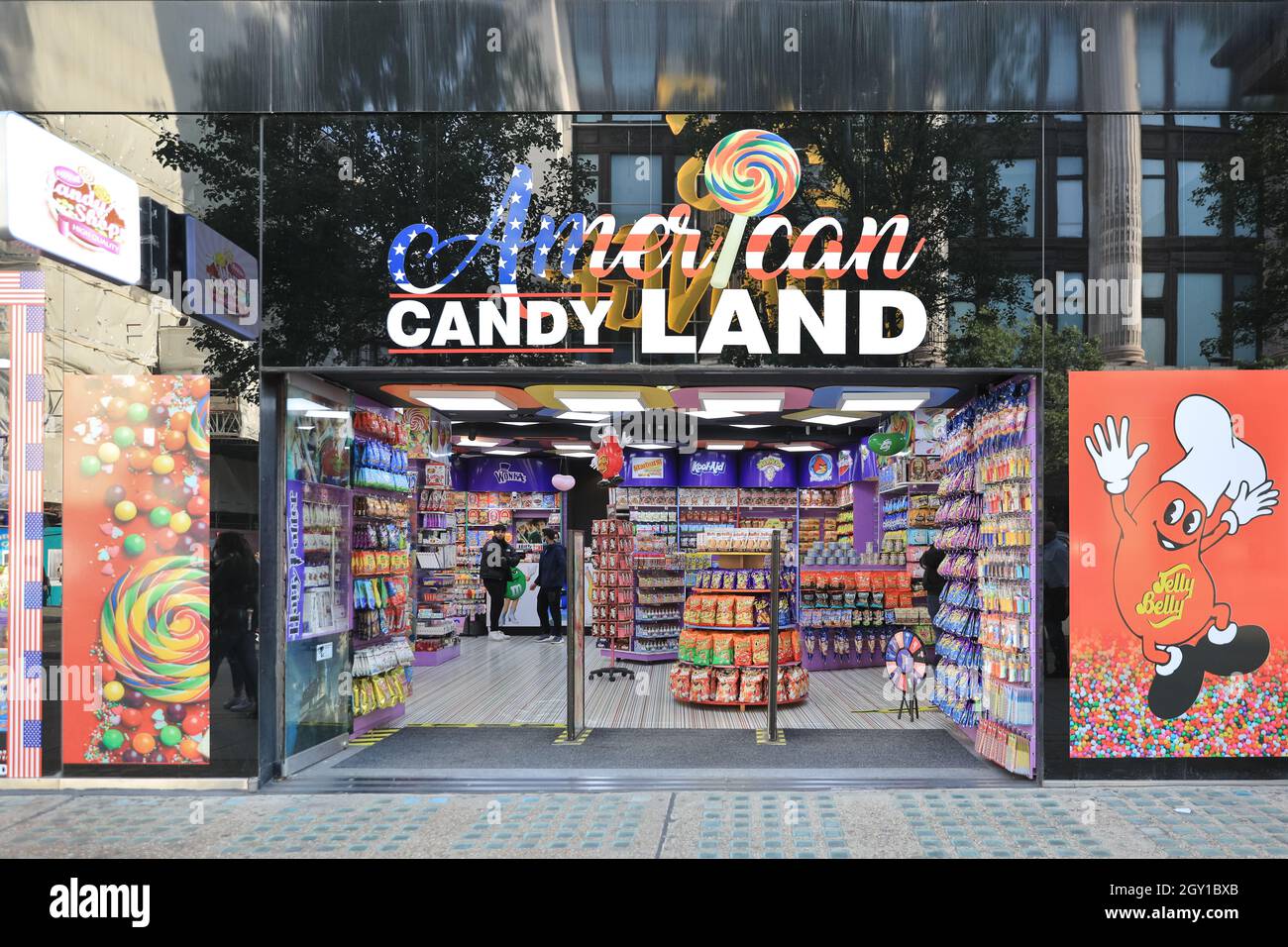 American Candy Land sweet shop, people and store exterior on Oxford Street, London, England Stock Photo