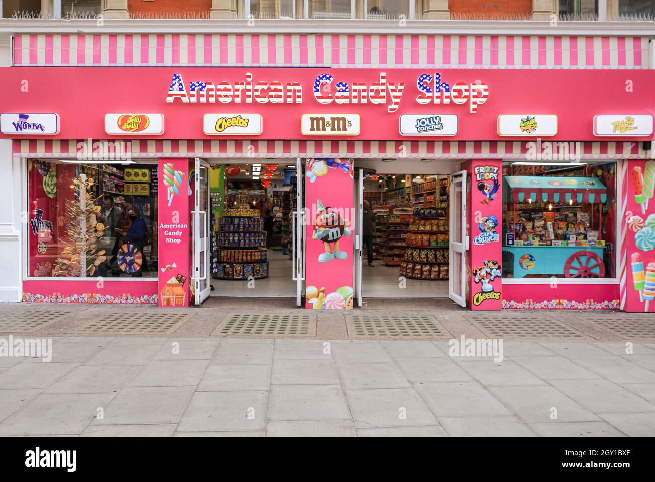 American Candy Shop and shoppers, exterior, Oxford Street, West End,  London, England, UK Stock Photo - Alamy