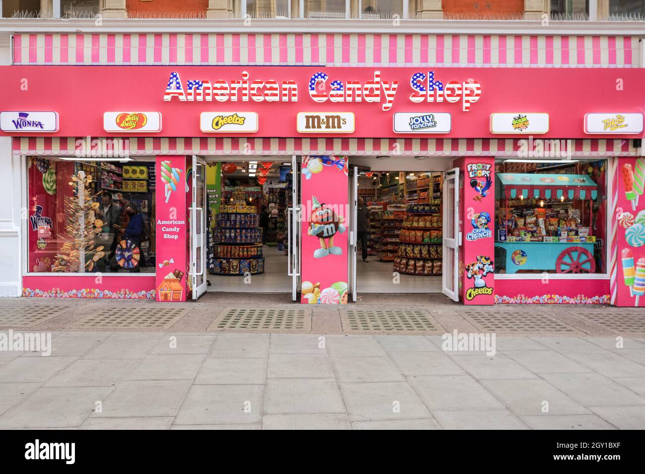 American Candy Shop and shoppers, exterior, Oxford Street, West End, London, England, UK Stock Photo