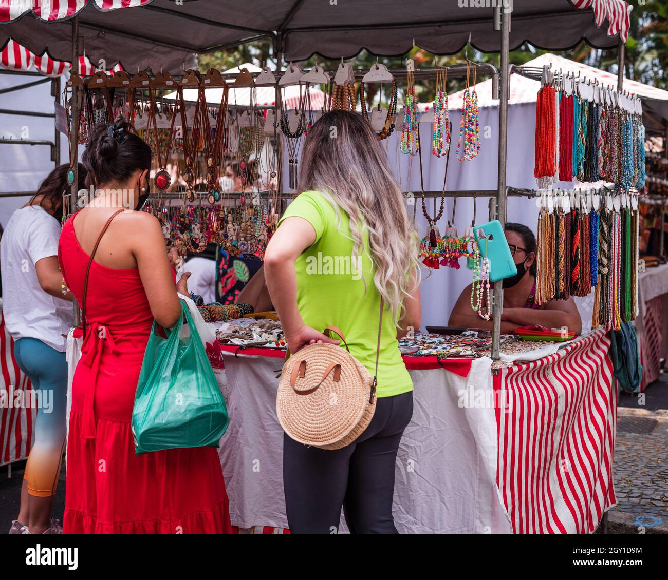 Women shopping for costume jewelry at the Belo Horizonte Hippie