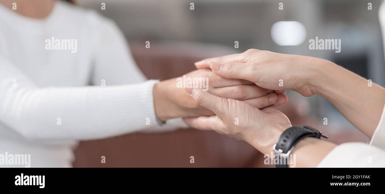 Young woman consulting with the psychologist. Stock Photo