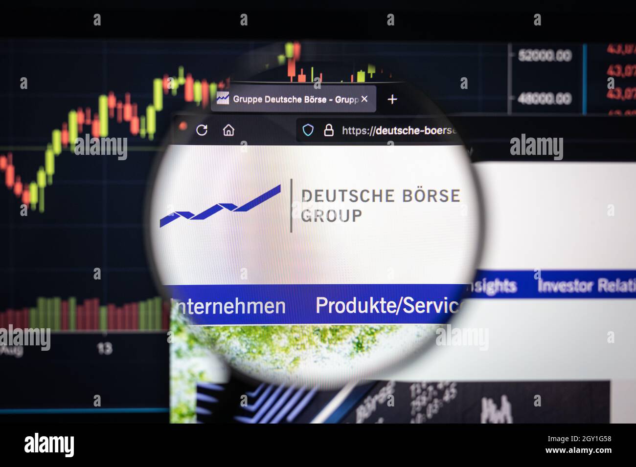 Deutsche Boerse Group company logo on a website with blurry stock market developments in the background, seen on a computer screen Stock Photo