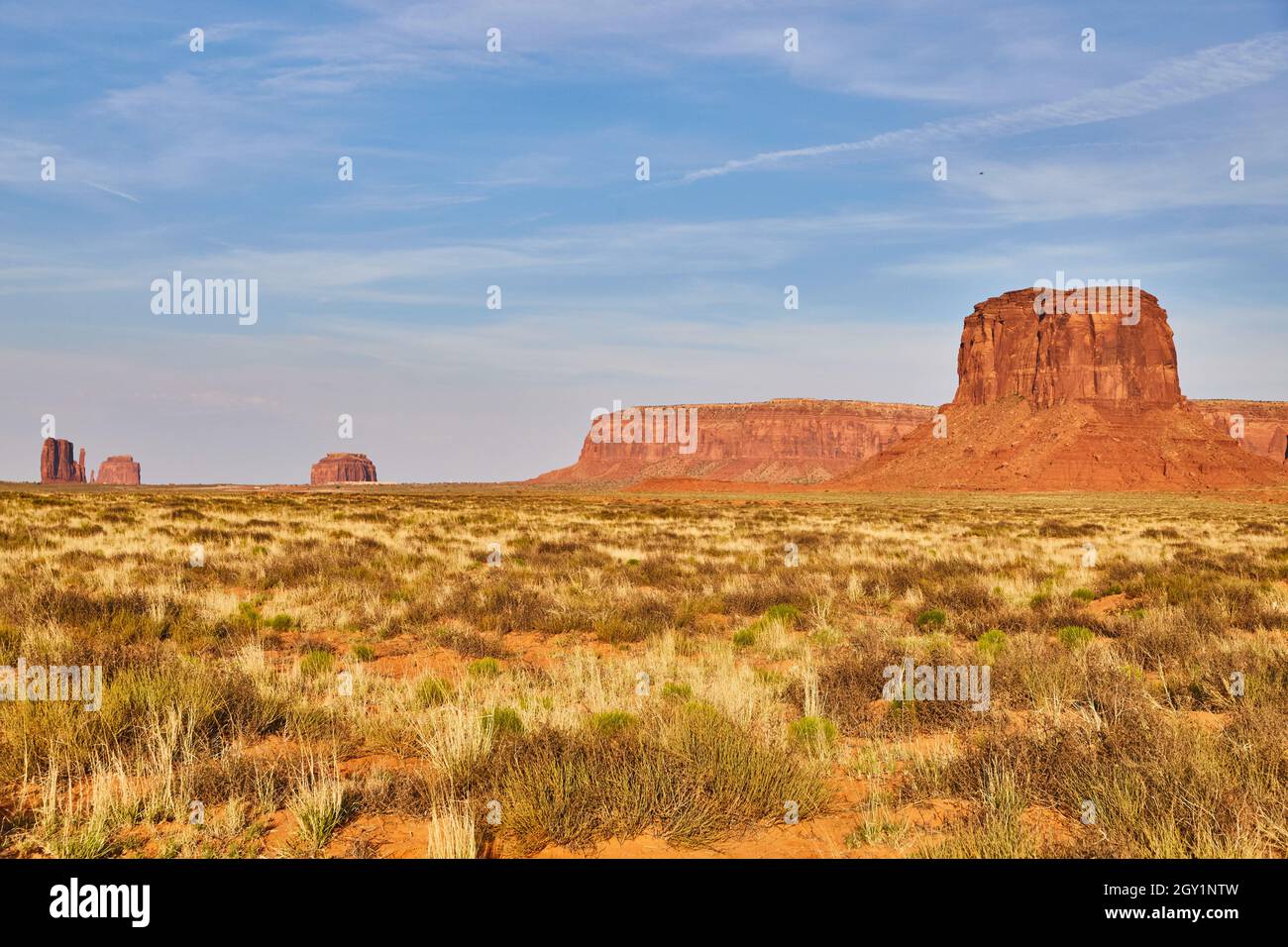 Monument valley large red rock pillars in desert Stock Photo - Alamy