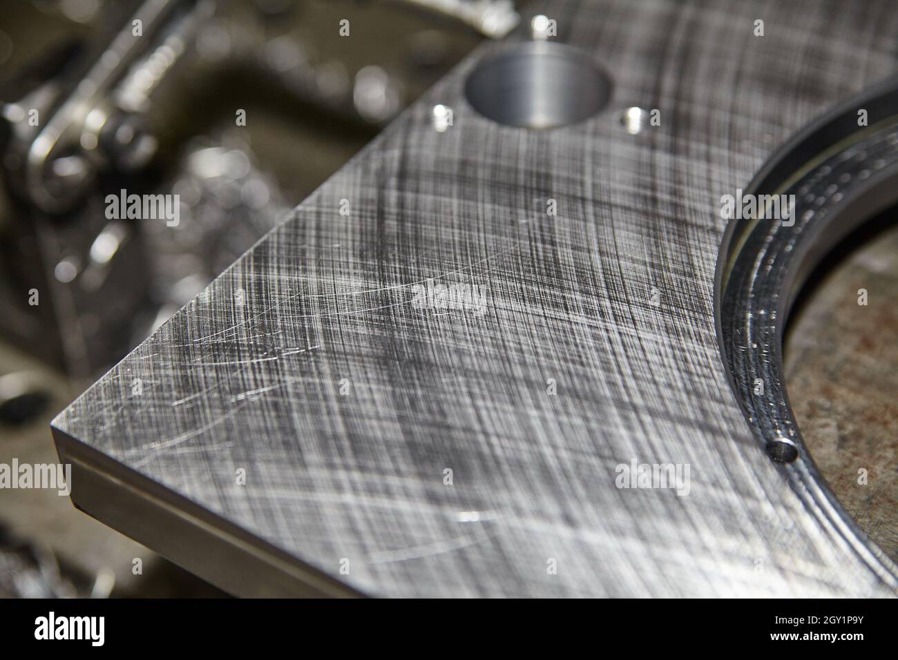 Stainless steel block with lathe marks and scratches Stock Photo Alamy