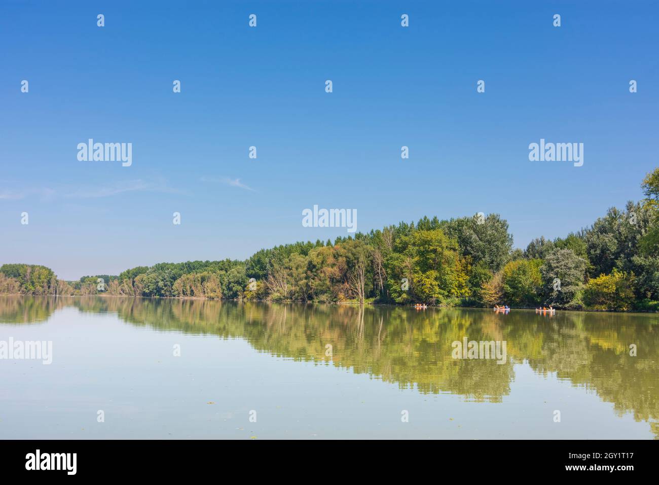 Szigetköz (Little Rye Island, Kleine Schüttinsel): anabranch, arm of river Danube, canoeist, forest in , Györ-Moson-Sopron, Hungary Stock Photo