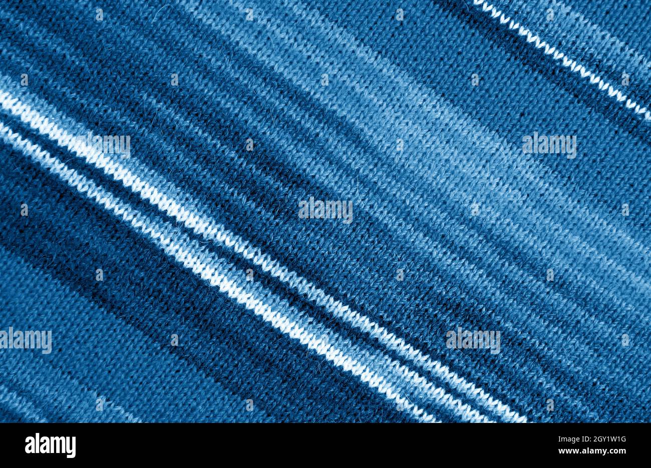 Gradient Indigo Blue Striped Alpaca Knitted Wool Fabric in Diagonal Patterns Stock Photo