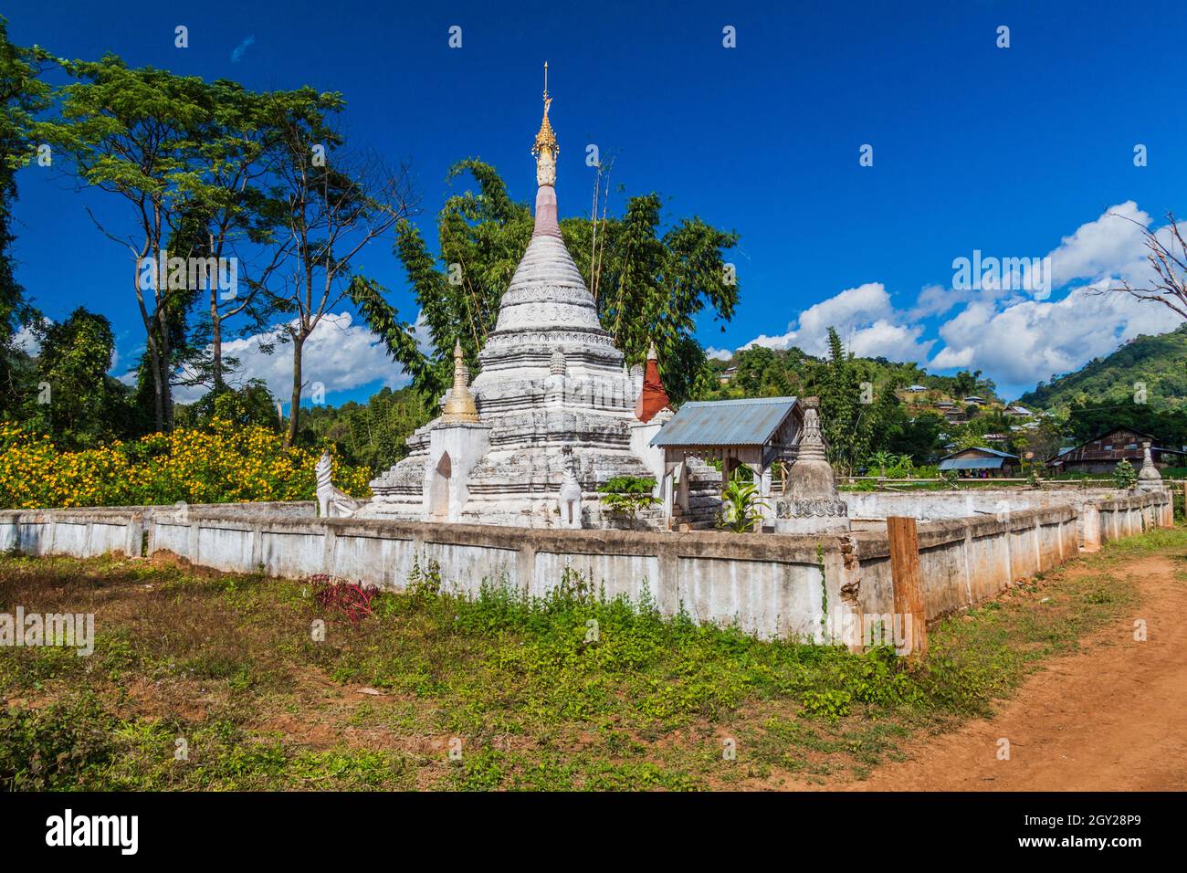 Buddhist stupa in village hi-res stock photography and images - Alamy