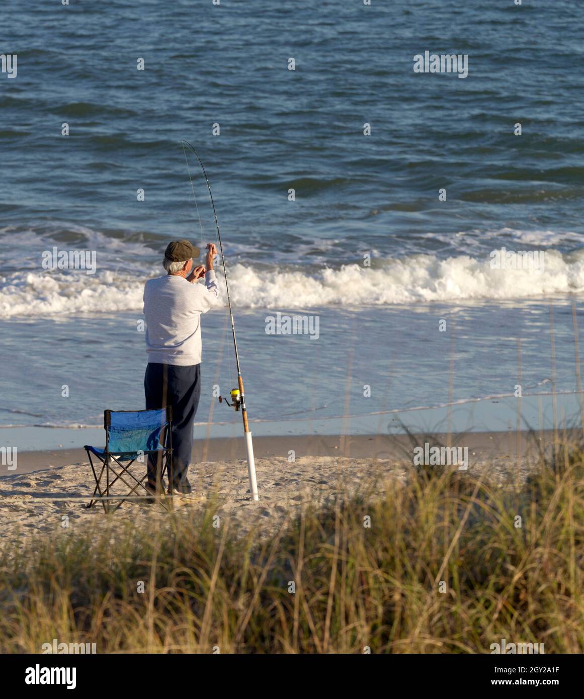 Fishing pole in the sand hi-res stock photography and images - Page 2 -  Alamy
