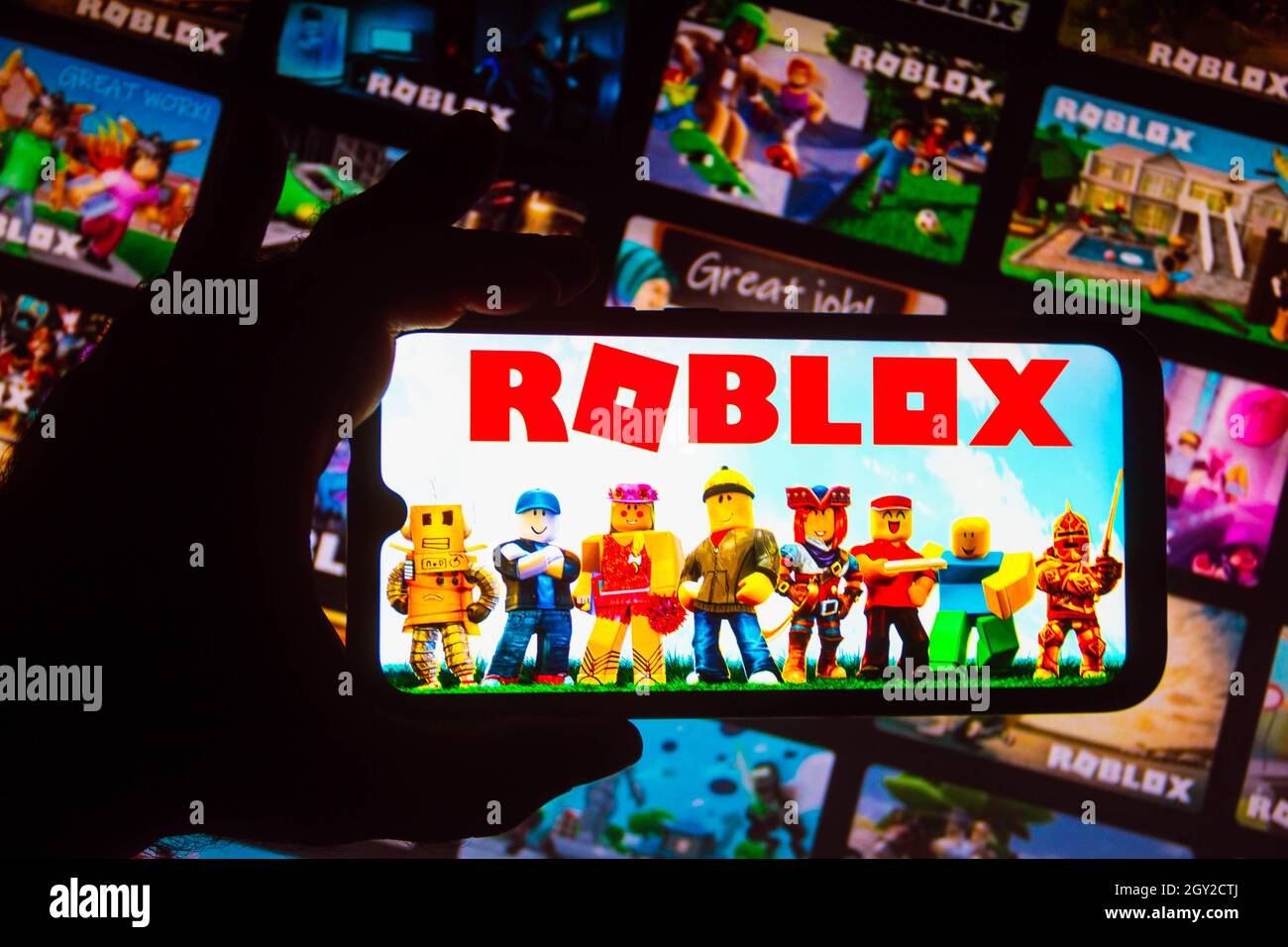 In this photo illustration the Roblox logo of an online game platform is  seen on a smartphone and a pc screen. (Photo by Pavlo Gonchar / SOPA  Images/Sipa USA Stock Photo 