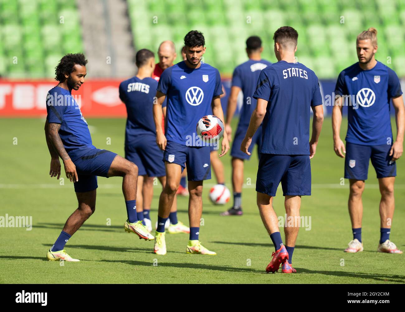 Austin, Texas, USA. 6th October, 2021. Members of the United States Men's National Team (USMNT) warm up for practice at Austin's Q2 stadium on Wednesday, October 6, 2021. The U.S. team will face Jamaica on Thursday in a World Cup qualifying match. Credit: Bob Daemmrich/Alamy Live News Stock Photo