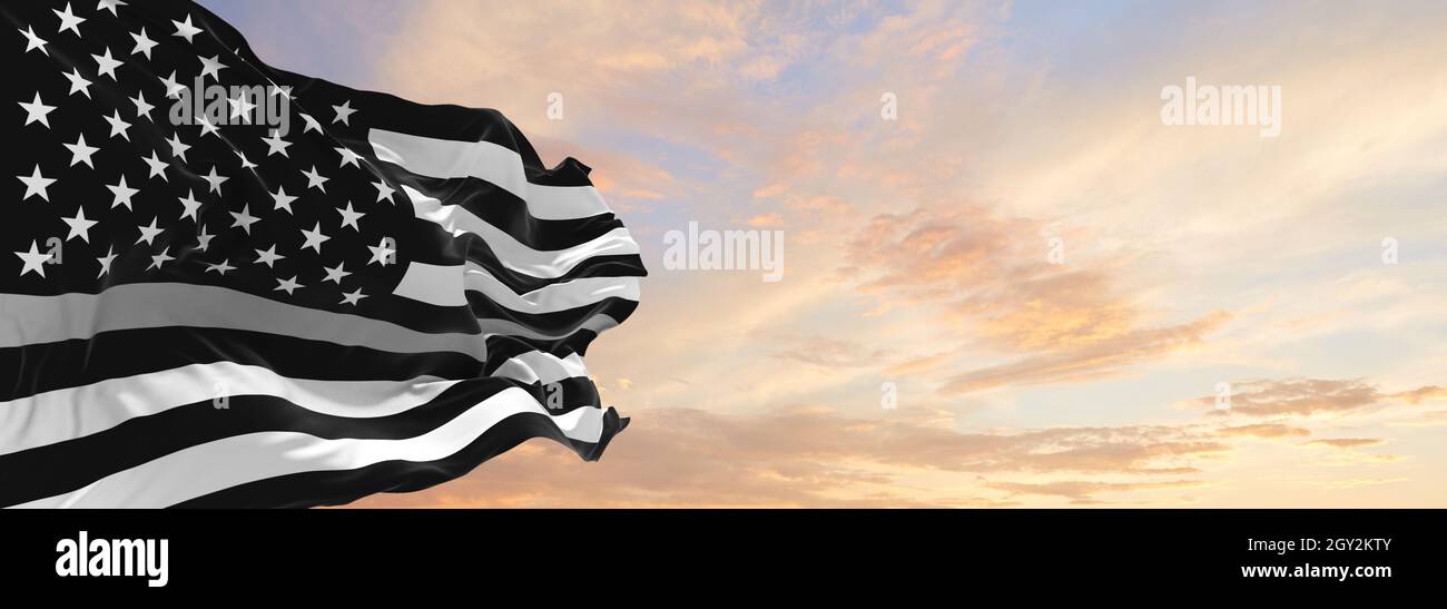Thin Silver Line USA flag waving at cloudy sky background on sunset, panoramic view. Correction Officers, Jailers, Probation Parole Officers, Bailiffs Stock Photo