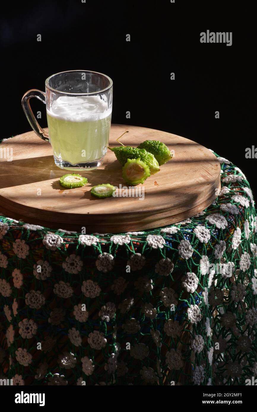 Bitter gourds juice photo Stock Photo Alamy