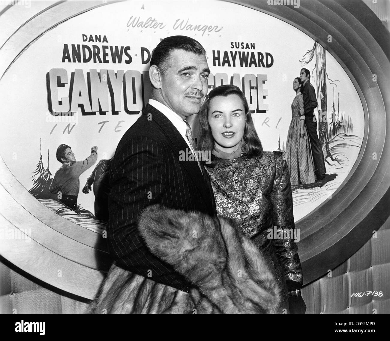 CLARK GABLE and ELLA RAINES attending the Hollywood Premiere in July 1946 of Dana Andrews Dan Duryea and Susan Hayward in CANYON PASSAGE 1945 director Jacques Tourneur producer Walter Wanger publicity for Universal Pictures Stock Photo