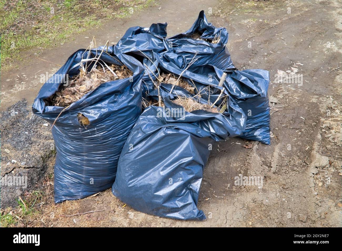 Three big blacks garbage bags full of trash Stock Photo - Alamy