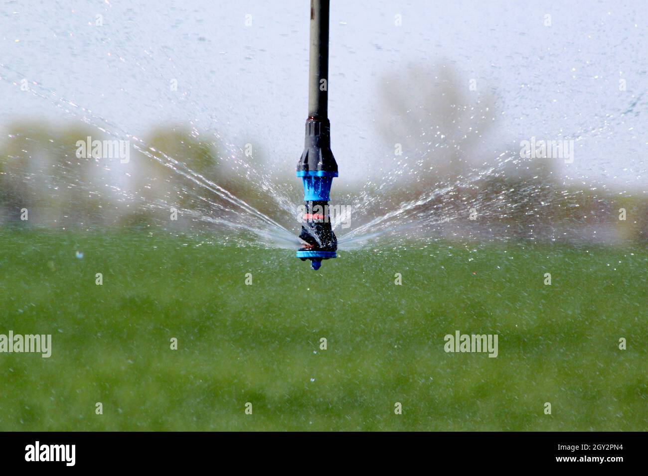 Irrigation spraying system in field Stock Photo Alamy