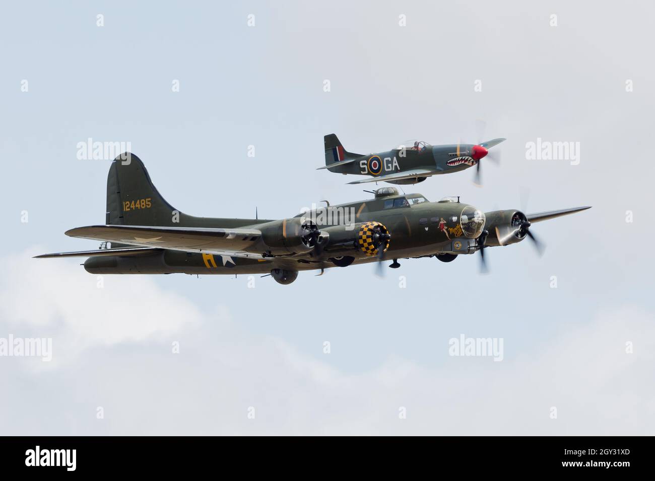 USAAC Boeing B17G Flying Fortress Vintage WW2 Bomber with P51D Vintage WW2 Fighter at Flying Legends Duxford Airshow Stock Photo