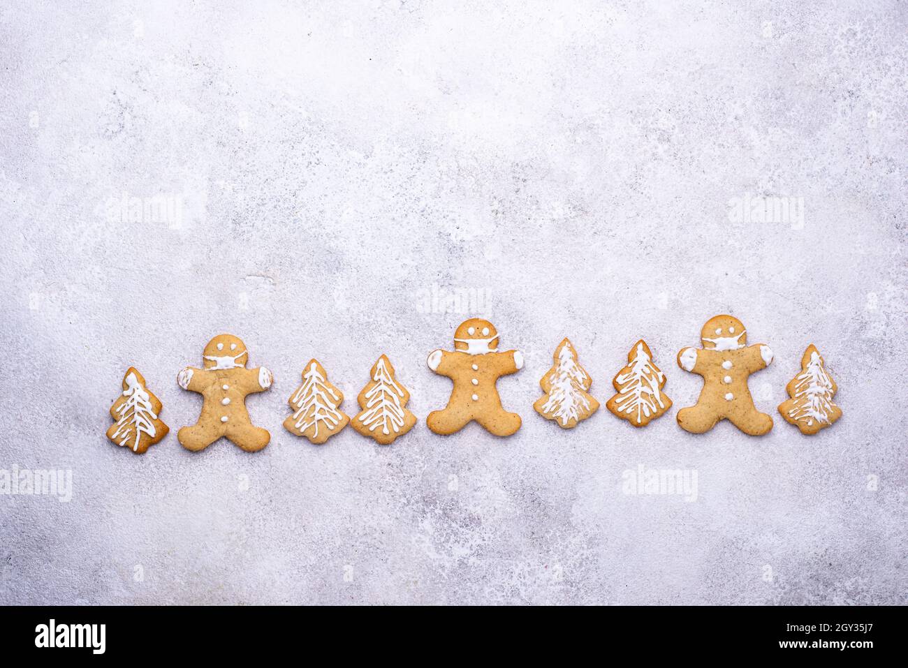 Christmas gingerbread cookies in face masks Stock Photo - Alamy