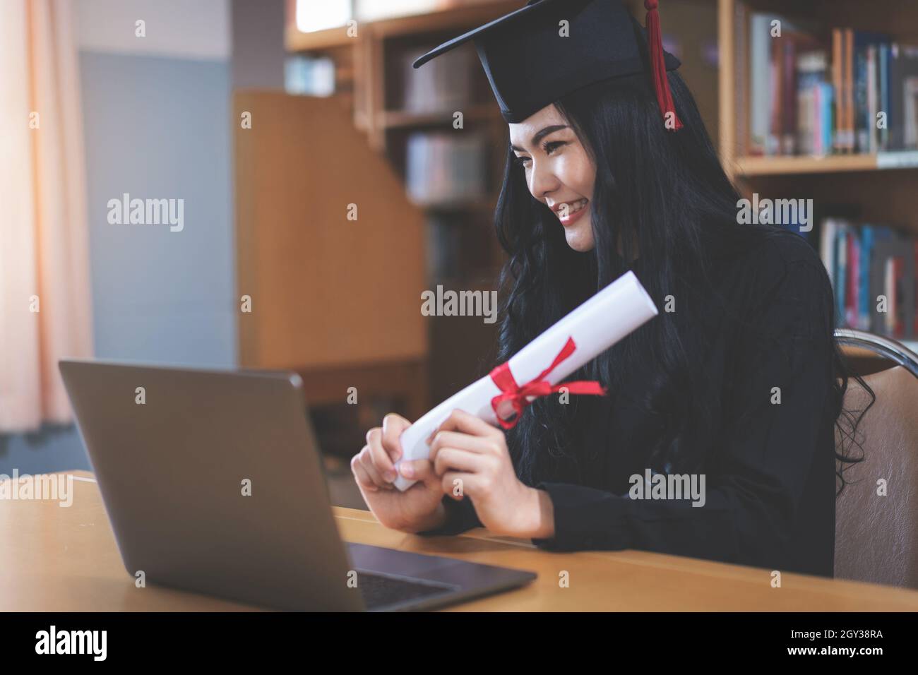 Young university student expressing joy and excitement for graduation ...