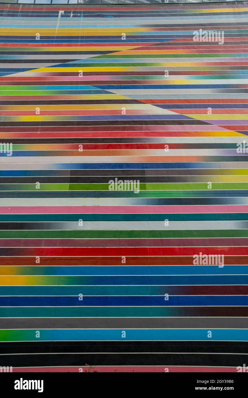 Abstract rainbow colored facade background Stock Photo