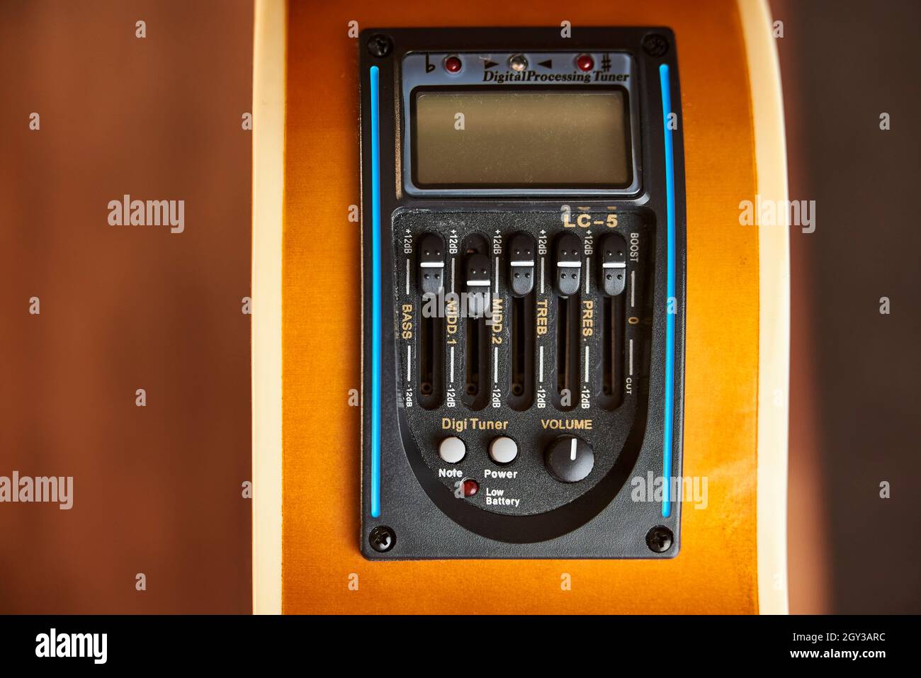 Built-in tuner, detail of an electric acoustic guitar. Image without people  Stock Photo - Alamy