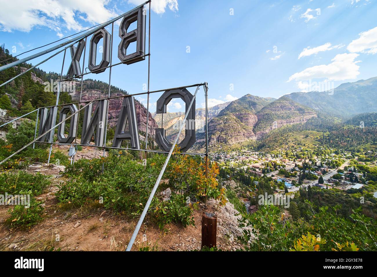 Iconic Box Canon sign of Ouray, Colorado from behind and overlooking